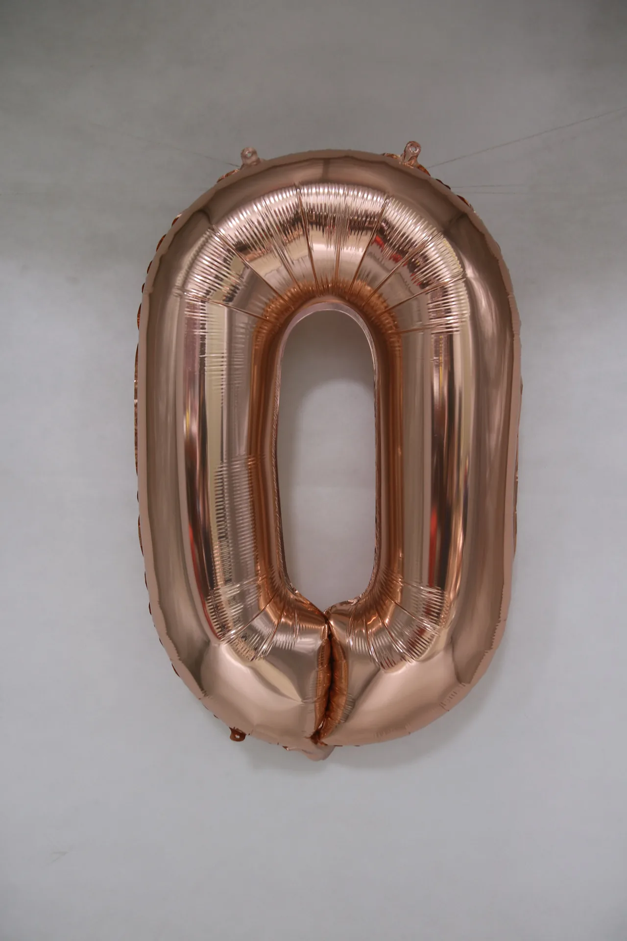 Rose gold number foil balloon
